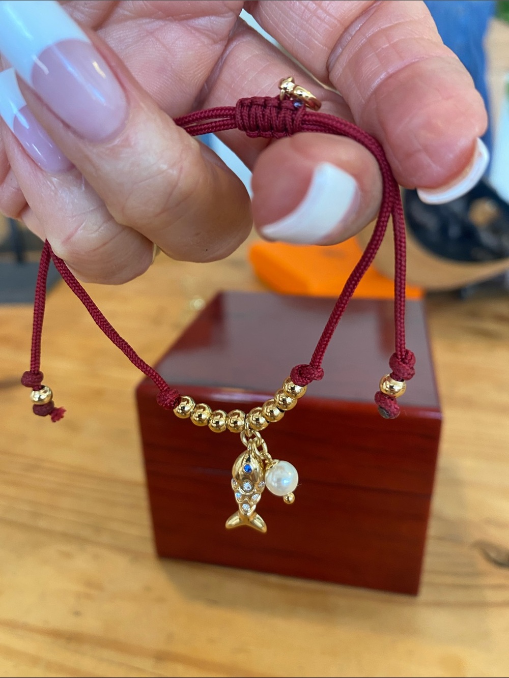 Like New! Kate Spade Gold Fish Charm Bracelet on Red Cord!